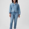 Jeans slim vintage a vita media con orlo diviso Jeans slim vintage a vita media con orlo diviso