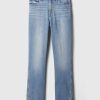 Jeans slim vintage a vita media con orlo diviso Jeans slim vintage a vita media con orlo diviso
