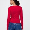 Maglietta Henley in jersey lavorato a maglia stretta Maglietta Henley in jersey lavorato a maglia stretta