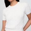 Maglione corto in maglia a trecce 100% cotone