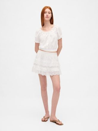 Mini gonna-pantalone con volant e occhielli