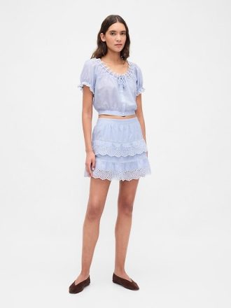 Mini gonna-pantalone con volant e occhielli