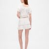 Mini gonna-pantalone con volant e occhielli Mini gonna-pantalone con volant e occhielli