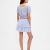 Mini gonna-pantalone con volant e occhielli