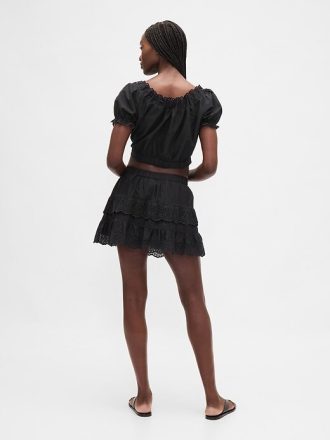 Mini gonna-pantalone con volant e occhielli