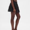 Mini gonna-pantalone con volant e occhielli Mini gonna-pantalone con volant e occhielli