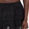 Mini gonna-pantalone con volant e occhielli Mini gonna-pantalone con volant e occhielli