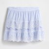 Mini gonna-pantalone con volant e occhielli