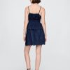 Minigonna in denim con occhielli Minigonna in denim con occhielli