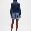 Minigonna in denim plissettato Minigonna in denim plissettato