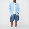 Pantaloncini cargo larghi in denim da 11″