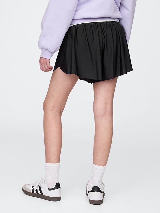 Pantaloncini da corsa con orlo a farfalla per bambini Pantaloncini da corsa con orlo a farfalla per bambini