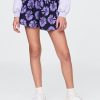 Pantaloncini da corsa per bambini ad asciugatura rapida con orlo a farfalla