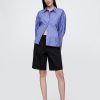 Pantaloncini lunghi in denim a vita media da 11″