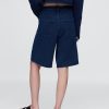 Pantaloncini lunghi in denim French Terry a vita media da 11″ Pantaloncini lunghi in denim French Terry a vita media da 11″