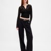 Pantaloni a gamba larga con pieghe a vita bassa 365 Pantaloni a gamba larga con pieghe a vita bassa 365