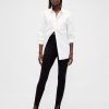 Pantaloni a vita alta con doppia staffa in maglia Pantaloni a vita alta con doppia staffa in maglia