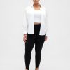 Pantaloni a vita alta con doppia staffa in maglia Pantaloni a vita alta con doppia staffa in maglia
