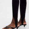 Pantaloni a vita alta con doppia staffa in maglia Pantaloni a vita alta con doppia staffa in maglia