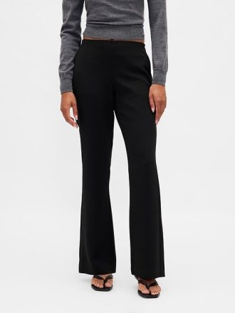 Pantaloni a zampa in twill a vita bassa
