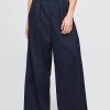 Pantaloni cachi a gamba larga con pieghe in twill a vita alta