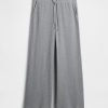 Pantaloni da pigiama a gamba larga a nido d’ape Pantaloni da pigiama a gamba larga a nido d’ape