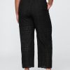 Pantaloni larghi e comodi con occhielli a vita media Pantaloni larghi e comodi con occhielli a vita media