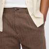 Pantaloni larghi plissettati color cachi in lino e cotone anni ’90 Pantaloni larghi plissettati color cachi in lino e cotone anni ’90