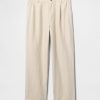 Pantaloni larghi plissettati color cachi in lino e cotone anni ’90 Pantaloni larghi plissettati color cachi in lino e cotone anni ’90