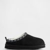 Pantofole per bambini in pelle scamosciata vegana con logo e fodera in sherpa Pantofole per bambini in pelle scamosciata vegana con logo e fodera in sherpa