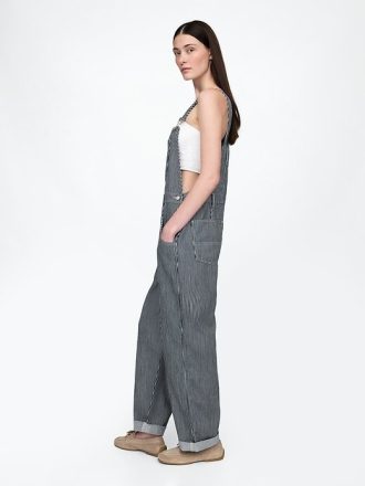 Salopette larga a righe in denim