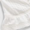 Top corto con peplo in voile con volant in pizzo Top corto con peplo in voile con volant in pizzo