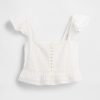 Top corto con peplo in voile con volant in pizzo Top corto con peplo in voile con volant in pizzo