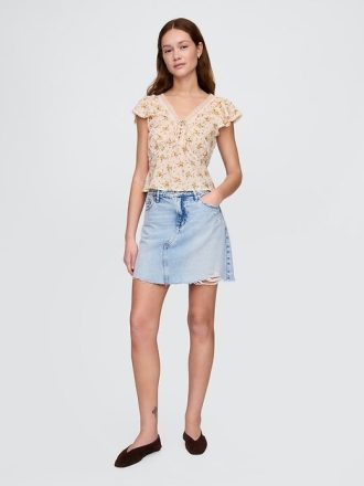 Top floreale con pizzo