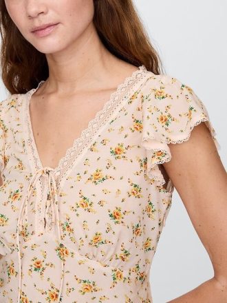 Top floreale con pizzo
