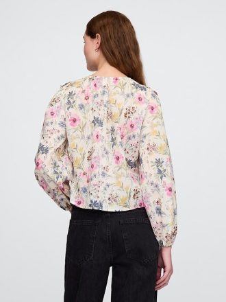 Top floreale con volant