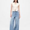Top in denim con laccetto al collo Top in denim con laccetto al collo