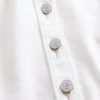 Top in denim con laccetto al collo Top in denim con laccetto al collo