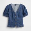 Top in denim con maniche a sbuffo e cuciture Top in denim con maniche a sbuffo e cuciture