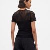 Top in pizzo floreale a rete Top in pizzo floreale a rete