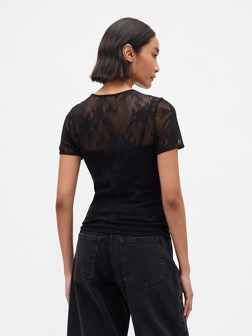 Top in pizzo floreale a rete Top in pizzo floreale a rete