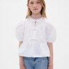 Top peplo con maniche a sbuffo per bambini Top peplo con maniche a sbuffo per bambini