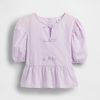 Top peplo con maniche a sbuffo per bambini Top peplo con maniche a sbuffo per bambini