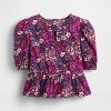 Top peplo con maniche a sbuffo per bambini Top peplo con maniche a sbuffo per bambini