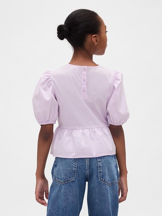 Top peplo con maniche a sbuffo per bambini Top peplo con maniche a sbuffo per bambini