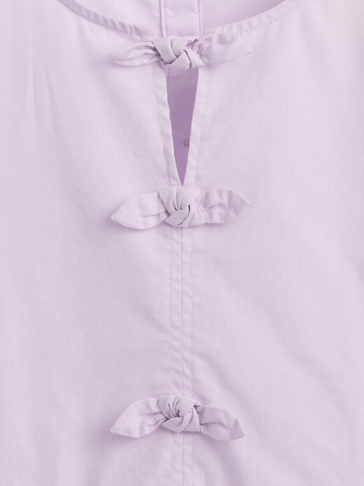 Top peplo con maniche a sbuffo per bambini Top peplo con maniche a sbuffo per bambini