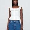 Top peplo con pizzo Top peplo con pizzo