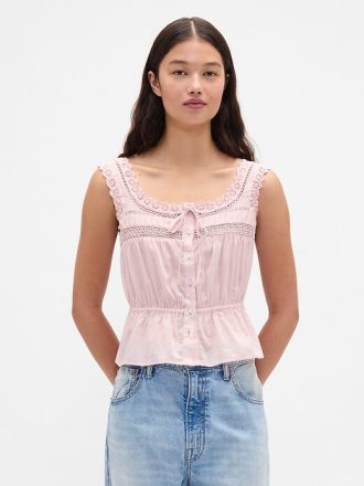 Top peplo con pizzo