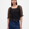 Top ricamato in tulle trasparente