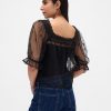 Top ricamato in tulle trasparente